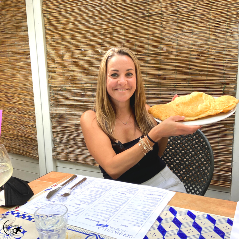 Picture of me with a giant calzone in Amalfi, Italy