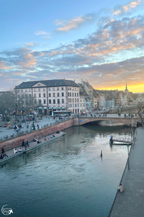 view of the river in Strasbourg France at sunset from the window of an apartment