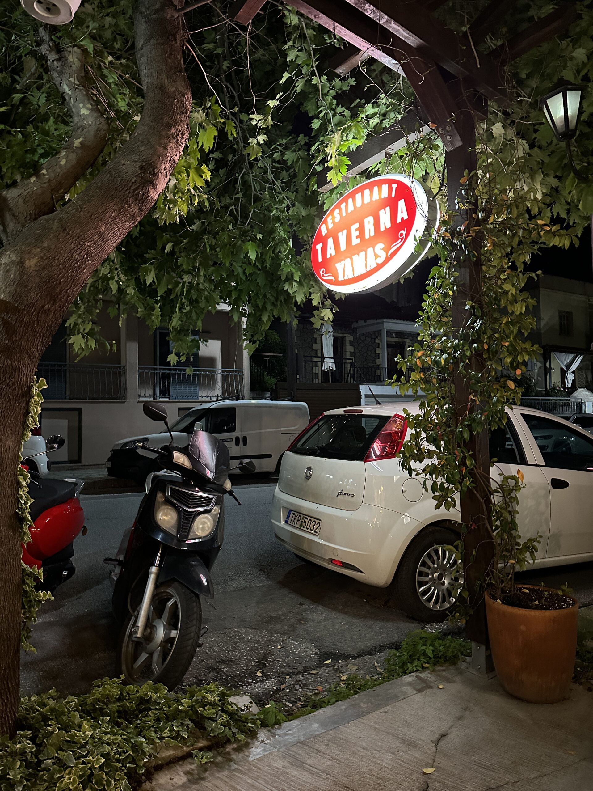 the sign for Yamas Taverna in Kalambaka Greece